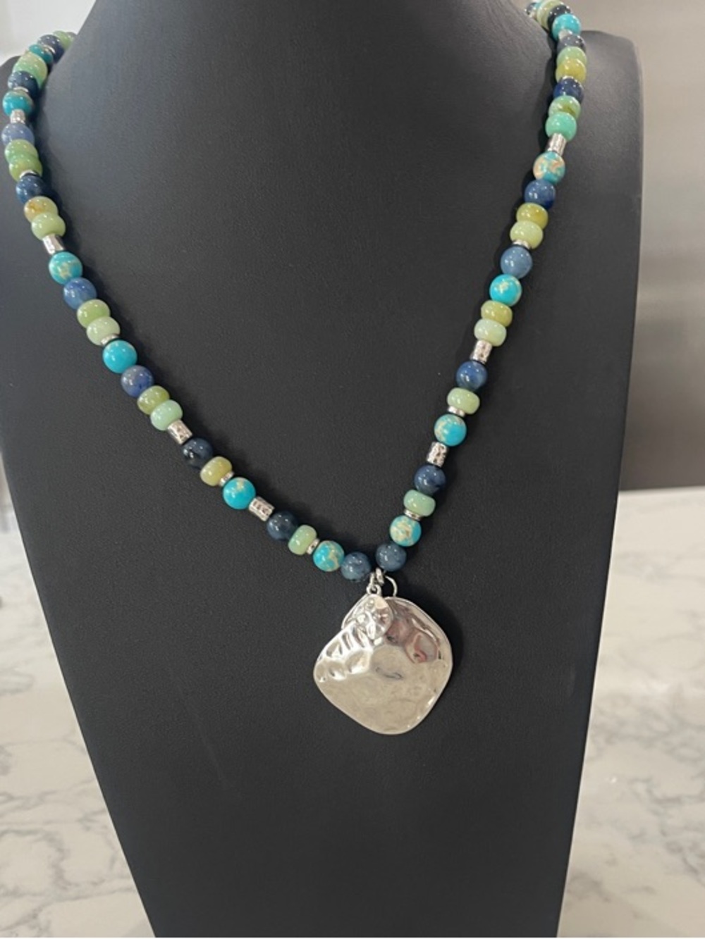 Handcrafted Multi-Color Beaded Necklace with Silver Pendant